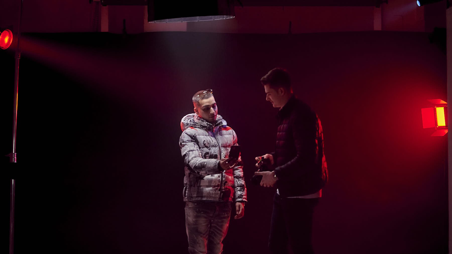 rapper JJ esko talking with videographer