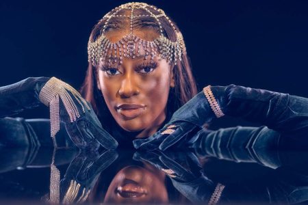 reflection of model wearing evening dress