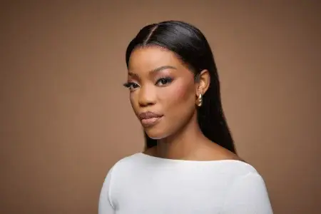 beauty portrait of black model against neutral brown background