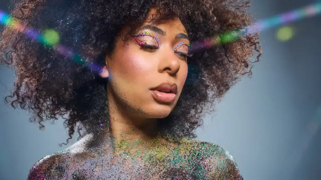beauty photo of model covered glitter 