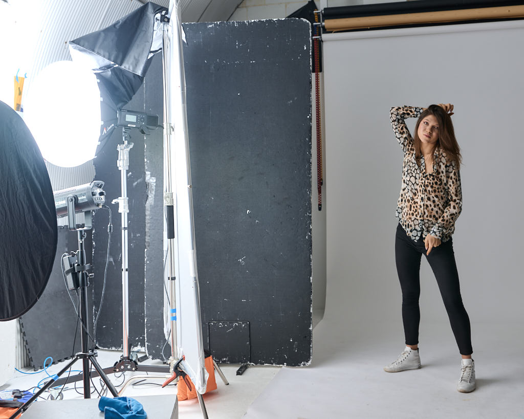 book light set up using lantern softbox and scrim panel